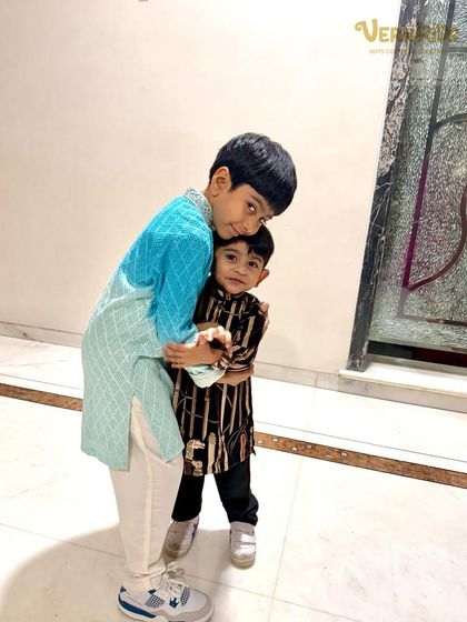 A heartwarming hug between two brothers, dressed in their favorite Vern Kids kurtas. Our outfits are made for creating precious family memories.