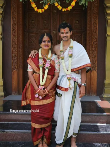 This is a traditional Madisar drape I did for a bride's muhurtham. We had only 10 minutes for a full saree and hairstyle change, showcasing how my professional draping skills can work perfectly even under pressure.