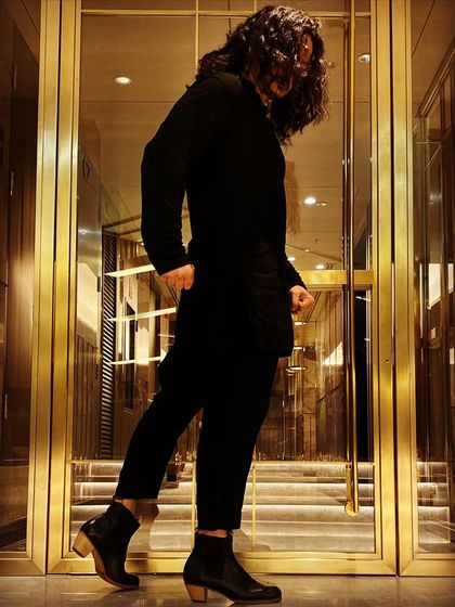 A pre-show moment of reflection and preparation in the green room.