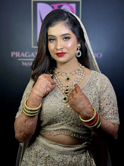 The full look, showcasing the beautiful gold-toned outfit, perfect for a reception or festive event.