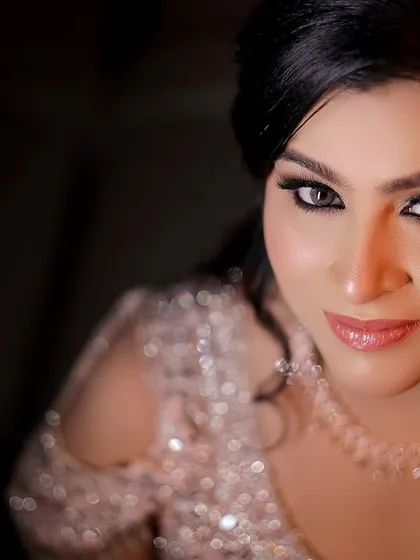 A striking close-up of the bride, highlighting her captivating eyes and flawless makeup. This is a powerful and beautiful bridal portrait.