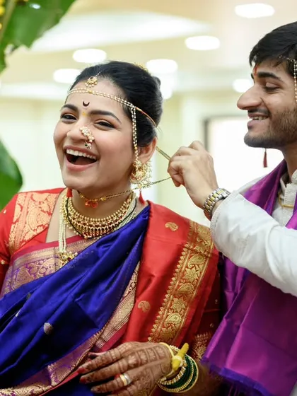 More laughter during the mangalsutra ritual. Capturing these genuine expressions of happiness is my main goal as a candid wedding photographer.
