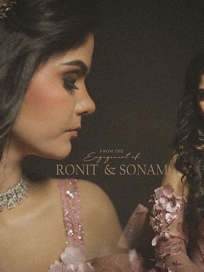 A dramatic and elegant portrait of the bride-to-be from her engagement. The dark background and soft lighting focus all the attention on her profile, makeup, and beautiful jewelry.