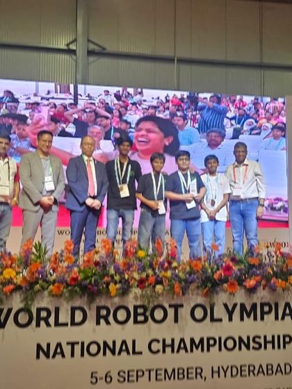 Our WRO 2025 national winners in the Robomission Elementary Category on stage, celebrating their Gold and Bronze medal victories.