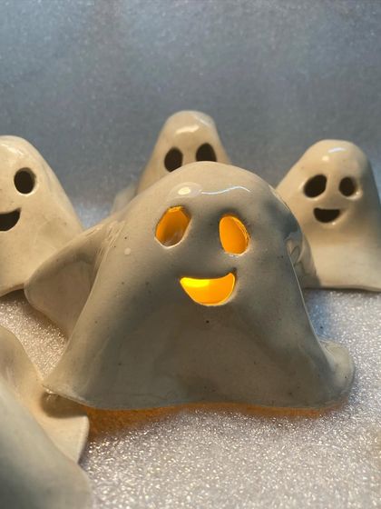 A family of happy ghosts. Each one is sold individually, but they love being in a group.