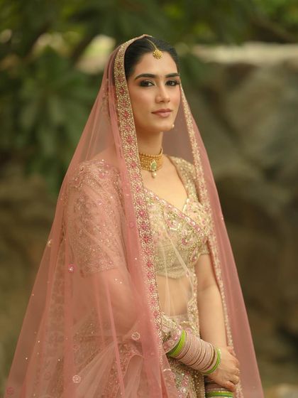 A direct, confident gaze. This portrait shows that you don't need heavy makeup to make a statement.