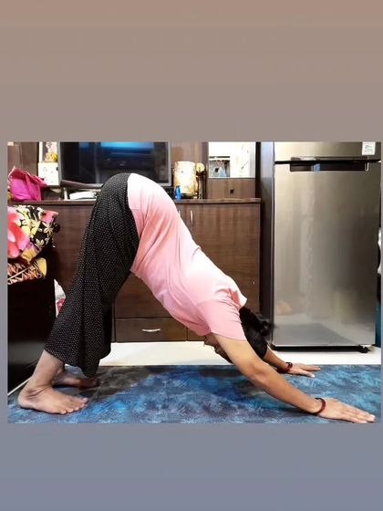 My mom practicing Adho Mukha Svanasana, or Downward-Facing Dog. It's inspiring to see her dedication, proving that you can maintain flexibility and strength at any age.