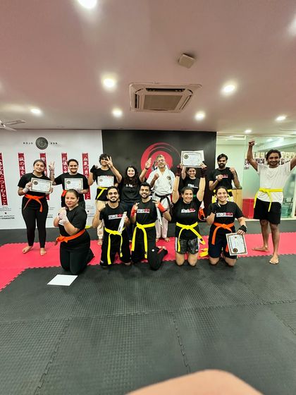 Celebrating achievements is important. Our members cheer as they receive their new belts and certificates, marking their hard work and dedication.