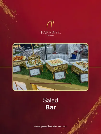 A beautifully arranged salad bar with a variety of fresh options. We use elegant stands and platters to make even the simplest dishes look grand.