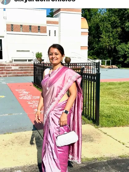 A client in the US wearing a shaded pink silk saree I customized for her with Kutchwork embroidery. She requested a single color of thread for an elegant look, and the result is beautiful.
