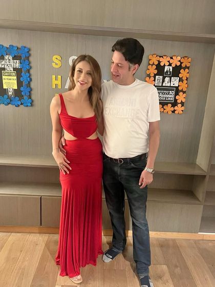 With my one and only Jiju. This red cutout dress is perfect for a party or a special evening out.