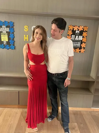 With my one and only Jiju. This red cutout dress is perfect for a party or a special evening out.
