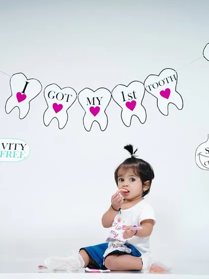 A little nibble to celebrate the new tooth. This session is a unique way to remember this important baby milestone.