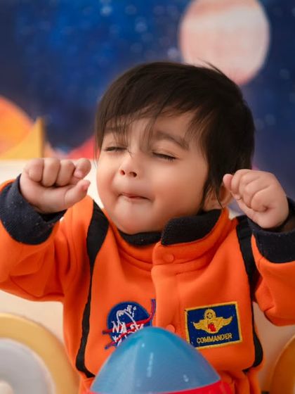Even astronauts get sleepy! This adorable, candid moment of a yawn adds a touch of humor and realness to the fantasy shoot.