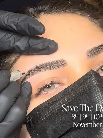 A close-up view of the microblading process in action. Our expert artist uses a precision tool to create fine, hair-like strokes, demonstrating the meticulous detail that goes into crafting each custom brow shape.