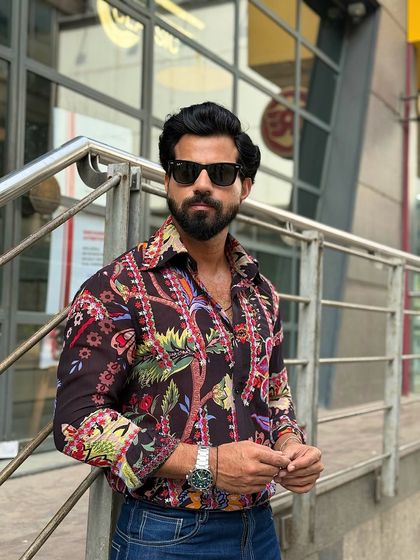 Make an entrance with our black floral shirt. The intricate, colorful pattern makes it a fantastic choice for parties and evening events where you want to stand out.