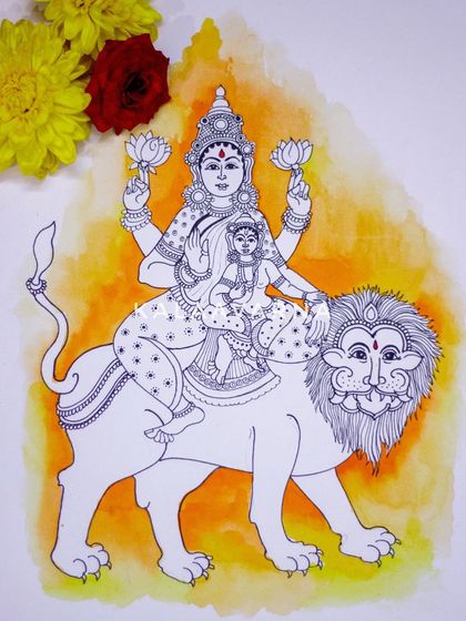 This is Devi Skandamata, the fifth form of Navadurga, shown with her son Skanda (Lord Kartikeya) in her lap. She rides a lion and holds lotuses in her hands.