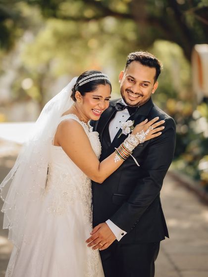 A burst of genuine laughter between the couple. I believe the best wedding photos are the ones that capture real joy and unscripted happiness.