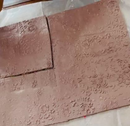 This is the back of the clay slab. I press a texture sheet into it so that even the underside of the trinket dish has a beautiful, tactile pattern.
