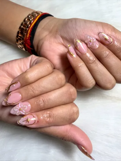 Another angle to appreciate the delicate craftsmanship of the FiDi floral nail art.