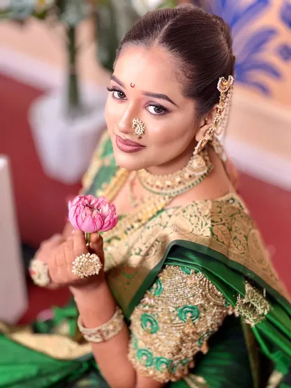 An elegant and royal Marathi bride look. I focus on creating a radiant, long lasting base with soft, shimmering eye makeup that photographs beautifully and lasts through all the ceremonies.