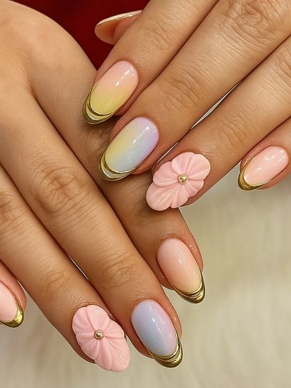 Soft pastels, gold swirls, and 3D florals give this set a dreamy elegance. I love combining different textures and effects, like the ombré base and sculpted flowers, to create a truly unique design.