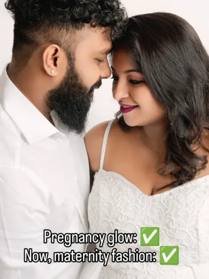 Pregnancy glow and maternity fashion on point. A close-up, intimate portrait of a couple, with the mom-to-be in a simple and elegant white gown.