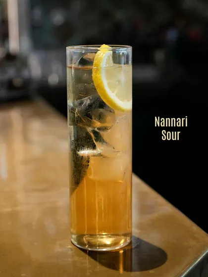 The Nannari Sour, a unique cocktail featuring the traditional Indian herb. Its distinct, earthy flavour gives this sour a memorable and refreshing twist.
