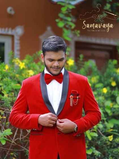 For the complete look, I also offer matching blazers for partners, like this sharp red one that perfectly complements the red gown for an outdoor couple shoot.