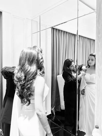 A behind the scenes peek at a final fitting. This is where the vision comes together. I work closely with every client, making sure every detail is perfect, from the drape of the fabric to the final alterations, so they feel completely confident and happy.