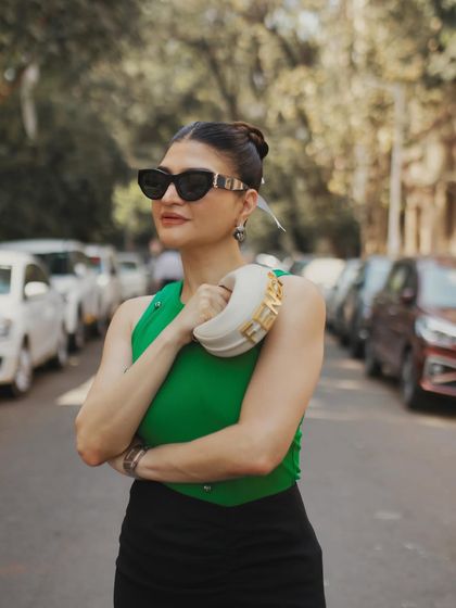 A street-style shoot in Colaba with Kat Diaries. The bright daylight and urban background create a fresh, modern look.