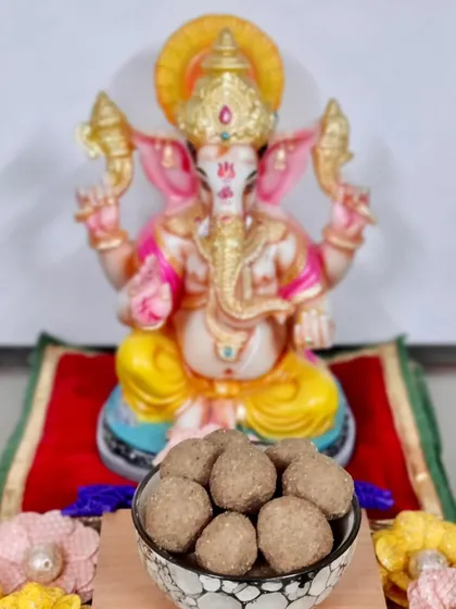 Get ready for Ganpati by ordering your favorite laddoos from our kitchen. Here is a bowl of our homemade Churma Ladoos offered to Ganpati Bappa.