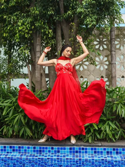 This is from a professional photoshoot where the makeup needed to be striking and camera-ready. I created a look that enhanced her features under professional lighting, paired with a vibrant red anarkali, ensuring the final photos were absolutely stunning.