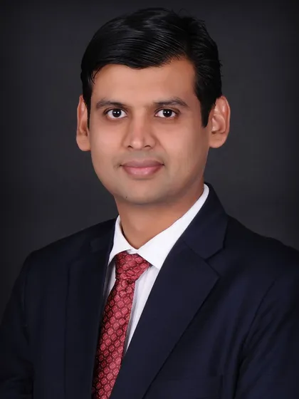 For a more formal and serious tone, I use a solid black backdrop. This style of business portrait photography adds a sense of authority and is excellent for executive bios, author photos, or any professional who wants a powerful image.
