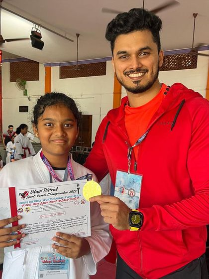 Celebrating a gold medal win at the 1st District Sports Karate Championship in Udupi. This is the first step towards state and national competitions.