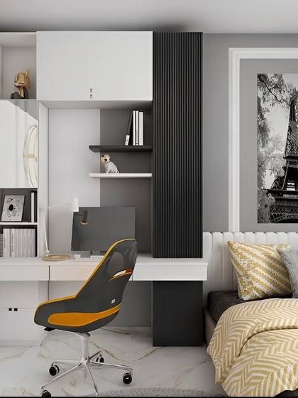 A compact and modern study area integrated next to the bed. The design uses contrasting black and white cabinetry with yellow accents for a bold look, complete with a Paris-themed artwork.