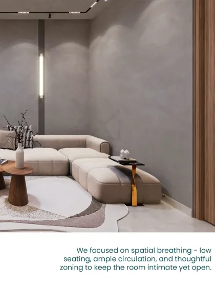 We focused on spatial breathing in this lounge, using low seating and ample circulation space to keep the room intimate yet open.