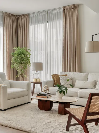 For our first villa project in Dubai, we created a light and airy living space perfect for a young family. The design uses a breathable palette of soft textiles, natural woods, and cane to create an expansive feel that is both functional and calming in the Dubai heat.