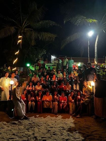 Our group celebrating Deepavali on the beach in Gokarna, with candles and sky lanterns lighting up the night.