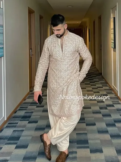 Another angle of the beige kurta set, showing its comfortable yet sharp fit.