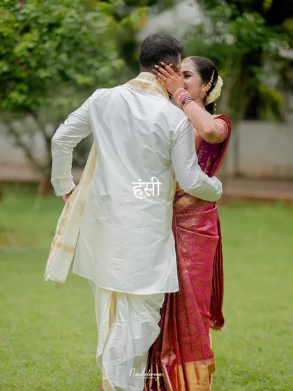 A stolen kiss captured from behind, with the word 'Hasi' (laughter/smile) overlaid, adding a touch of poetic, cultural storytelling.