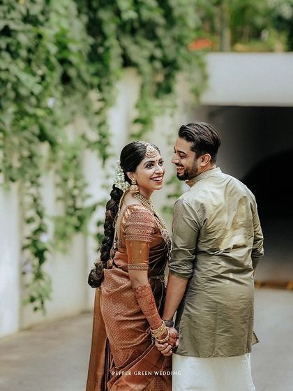 A romantic "look back" shot as the couple walks hand-in-hand, their connection evident in their shared glance.