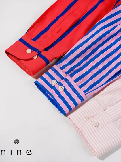 My work isn't just about formal jackets. We also craft vibrant, custom-stitched shirts like these bold striped pieces, perfect for adding a pop of color and personality to your wardrobe.