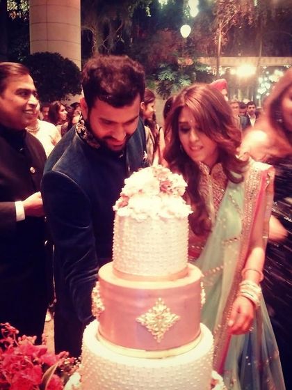 A wonderful memory from Ritika and Rohit Sharma's wedding celebrations at Antilia. I was honored when Mrs. Ambani trusted me to create this beautiful four-tier cake for the happy couple.