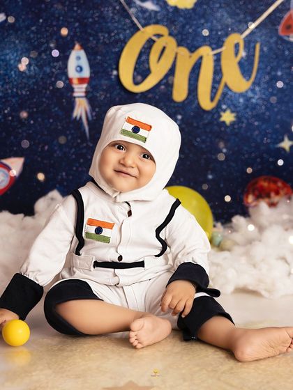 One small step for baby, one giant leap for cuteness! This little astronaut is ready for his first space mission in a custom-made suit, exploring a galaxy of stars in my studio.