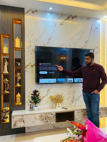 A close-up of the TV unit from the ATS Nobility project, which matches the one in images 10 and 11. This showcases the beautiful marble and wood combination.