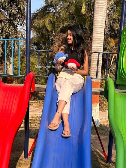 Taking our little crochet whale friends for a ride down the slide. We love seeing our creations become part of everyday fun and play.