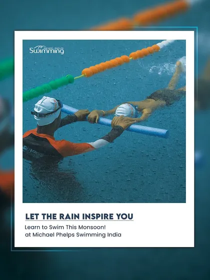 Let the rain inspire you to learn to swim this monsoon. This image shows a coach guiding a student in the water, emphasizing that our temperature-controlled pools in Mumbai, Pune, and Solapur provide the perfect comfortable environment, no matter the weather.