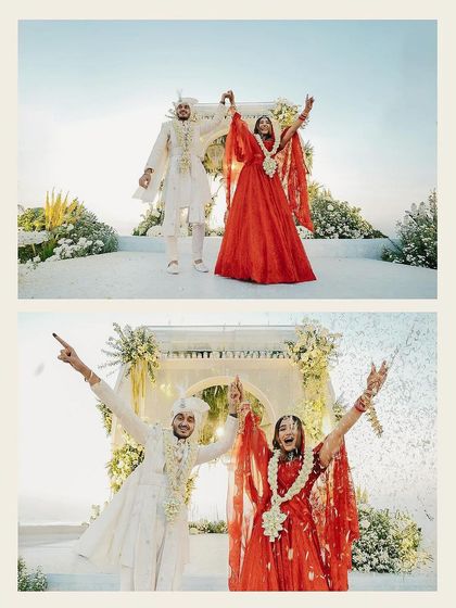 Pure celebration! This couple's energy is infectious. The bride's makeup is vibrant and celebratory, designed to match the joyous mood of their beach wedding.