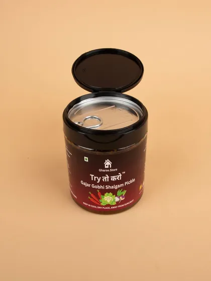 An open-lid shot of the Gajar Gobhi Shalgam Pickle.